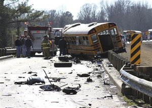 18-wheeler & school bus highway collision with injuries and fatality